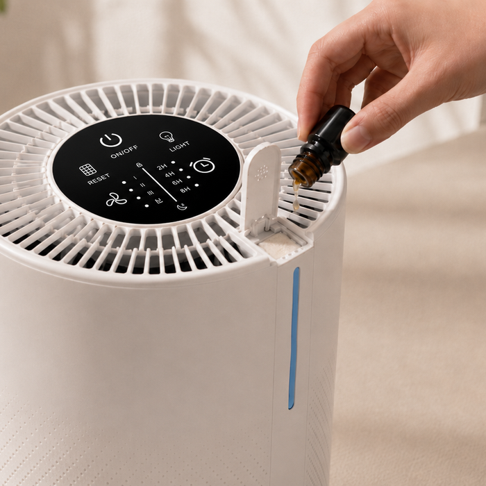 Adding essential oil to the aroma pad on a MOOKA HEPA air purifier—never on the filter