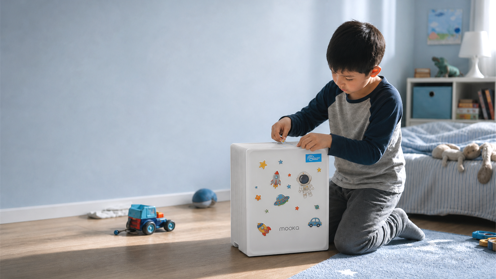 Child decorating the MOOKA KJ102 HEPA air purifier front panel with stickers in a cool-toned kids bedroom.